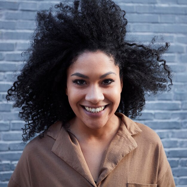 young-black-woman-with-afro-hair-laughing